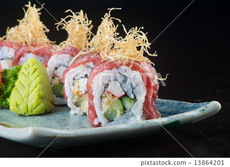 japanese cuisine. sushi on the background japanese cuisine. sushi on the background 13864201