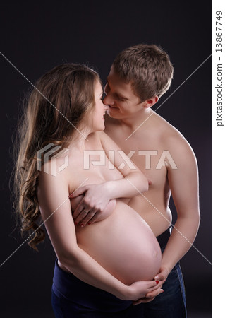 Concept of love and tenderness. Expectant couple 13867749