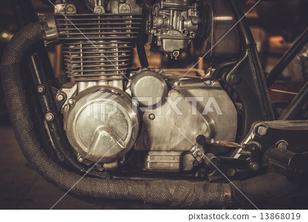 Close-up of a cafe-racer motorcycle engine 13868019