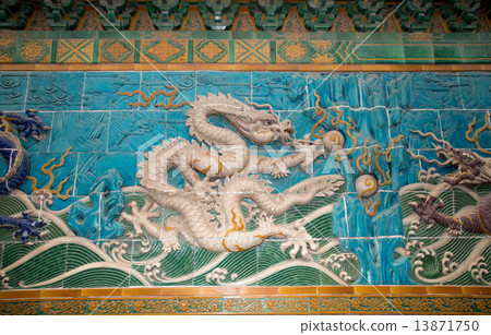 Dragon sculpture. The Nine-Dragon Wall (Jiulongbi) at Beihai park, Beijing, China. Dragon sculpture. The Nine-Dragon Wall (Jiulongbi) at Beihai park, Beijing, China. 13871750