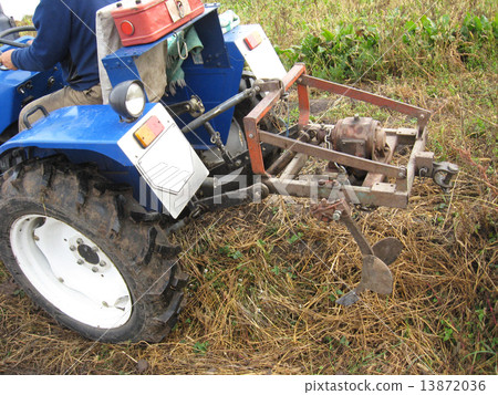 Tractor with a plough 13872036