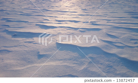 Snowdrifts at contre-jour lighting, sunset Snowdrifts at contre-jour lighting, sunset 13872457