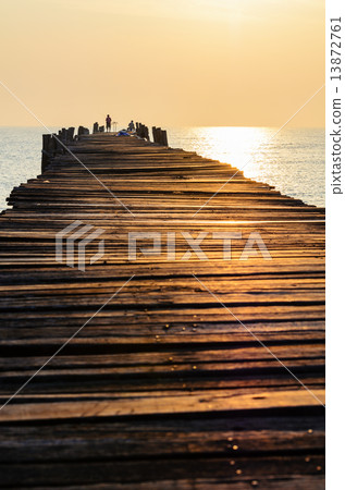 Old wooden pier at sunrise 13872761