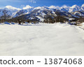 Snowy field and Hakuba Happoone ski resort 13874068