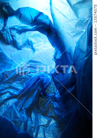 Abstract background of the insides of a blue plastic bag with different color shades 13874078