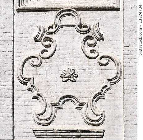 Cartouche on the wall of ancient Russian church in Totma 13874734
