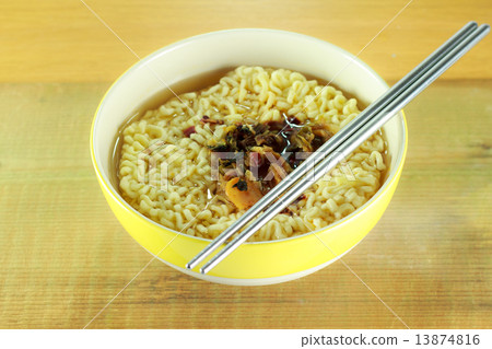 nstant noodles in yellow dish 13874816