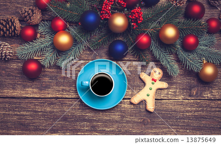 Hot coffee on a table near pine branches with chritmas balls 13875649