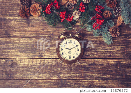 vintage alarm clock with branch of pine vintage alarm clock with branch of pine 13876372