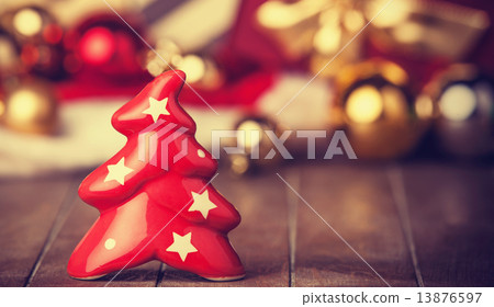 Bell tree and christmas gifts at background Bell tree and christmas gifts at background 13876597