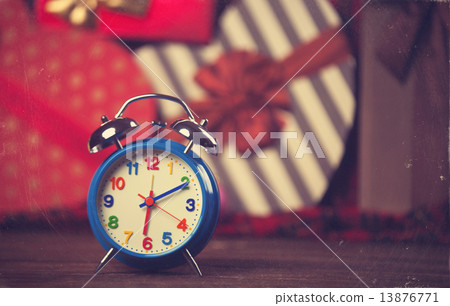 Vintage clock on christmas background Vintage clock on christmas background 13876771