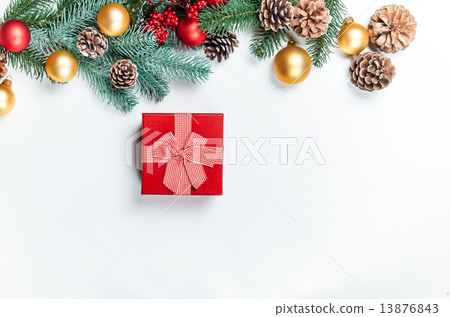 Christmas gift with pine branch on white background. 13876843