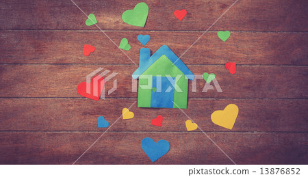 Paper house on wooden table. Paper house on wooden table. 13876852