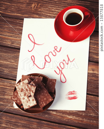 Cup of coffee, chocolate and letter. 13877818