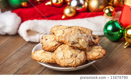 Cookies with christmas gifts on wooden table 13878790