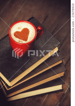 Cup of coffee with books 13878910