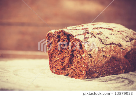 Delicious bread on a wood table 13879058