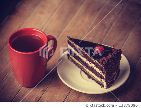 Cup of coffee with cake 13879080