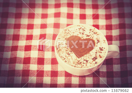 Cup of coffee with tartan 13879082