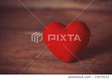 Heart shape on wooden table. Heart shape on wooden table. 13879252