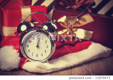 Vintage clock on christmas background Vintage clock on christmas background 13879471