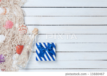 Gift box with net and bottle 13880467