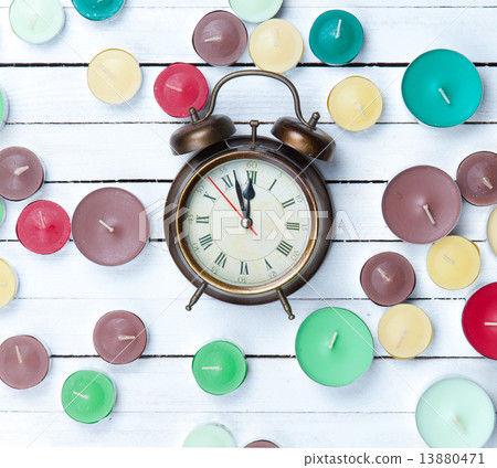 Retro alarm clock and candles Retro alarm clock and candles 13880471