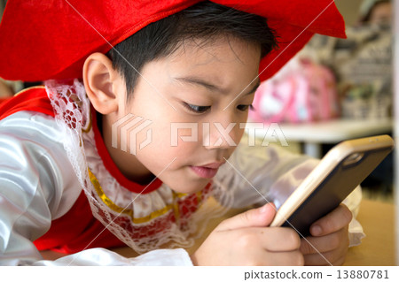 Asian child using a digital tablet together . Asian child using a digital tablet together . 13880781