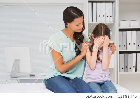 Little girl crying with her mother Little girl crying with her mother 13882479
