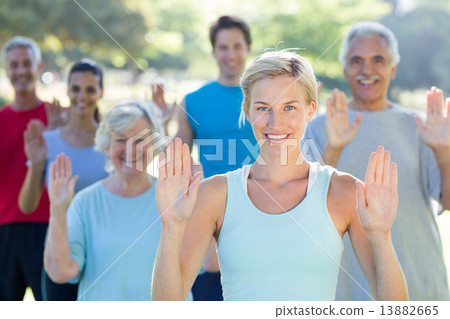 Happy athletic group showing their hands 13882665
