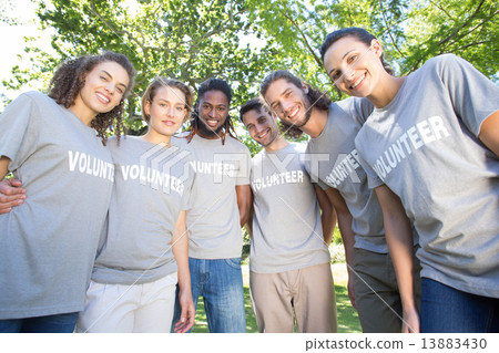 Happy volunteers in the park Happy volunteers in the park 13883430