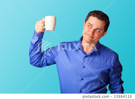 Casual man in shirt with cup on blue background. Casual man in shirt with cup on blue background. 13884118
