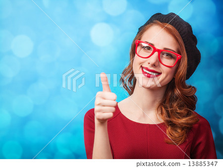 Redhead women in beret on blue background. Redhead women in beret on blue background. 13885347