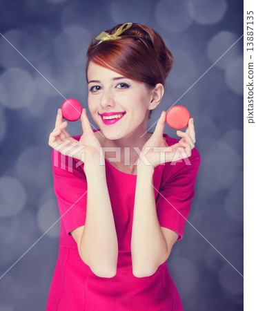Redhead girl with macaron for St. Valentine Day. Redhead girl with macaron for St. Valentine Day. 13887135