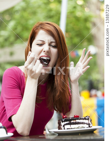 Style redhead girl with cup and cake Style redhead girl with cup and cake 13887229