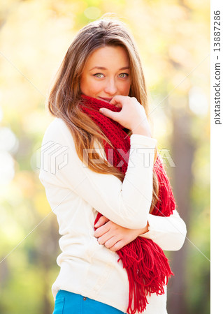 Teen girl in red scarf at autumn outdoor Teen girl in red scarf at autumn outdoor 13887286