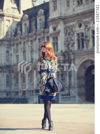 Style girl near retro building in Paris 13887381