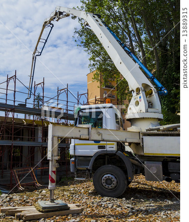 Construction site - pump truck at work 13889315