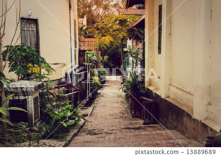 Alley with sunlight in Luang prabang, Laos. 13889689