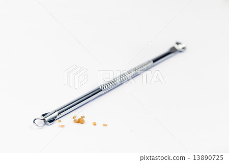 Pimple popping tool and the extracted blackheads 13890725