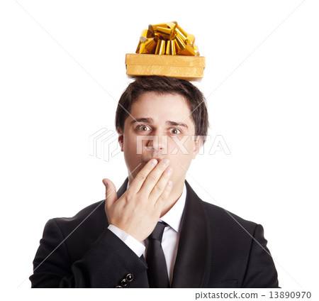 Brunette men with present box over head. Brunette men with present box over head. 13890970