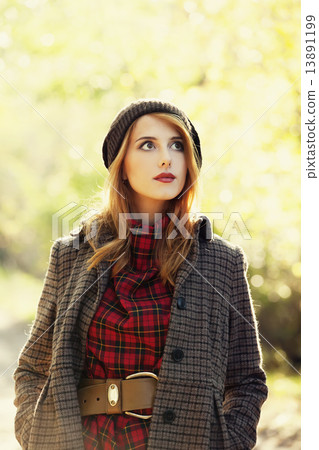 Style redhead girl at beautiful autumn alley. 13891199