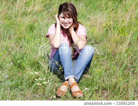 Happy girl at green grass. 13891203