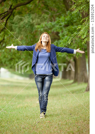 Young fashion girl at spring outdoor. Young fashion girl at spring outdoor. 13891204
