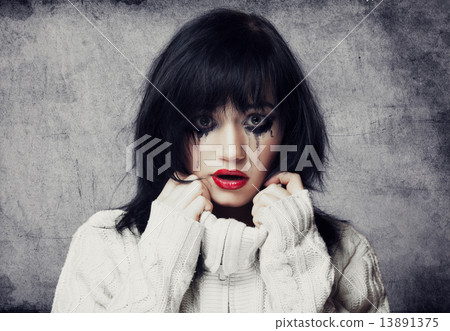 Portrait of a sad brunette. Portrait of a sad brunette. 13891375