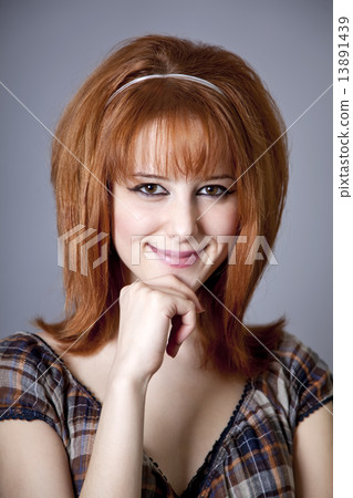 Portrait of red-haired girl. 60s style. 13891439