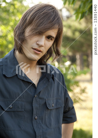 Smiling handsome man at outdoors Smiling handsome man at outdoors 13891440