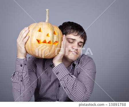 Funny men showing a pumpkin. Funny men showing a pumpkin. 13891788