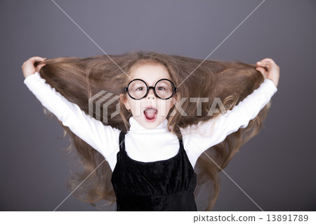 Little girl with long hair. 13891789