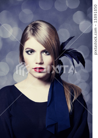 Portrait of beautiful girl with bokeh at background. 13891850